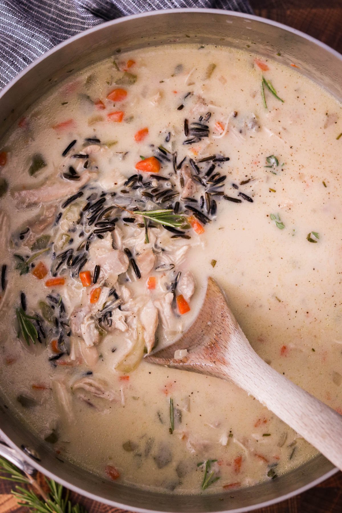 Large pot of chicken and wild rice soup, ready to serve.