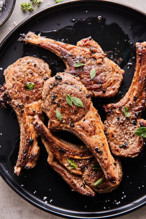 pan fried lamb chops in a cast iron skillet