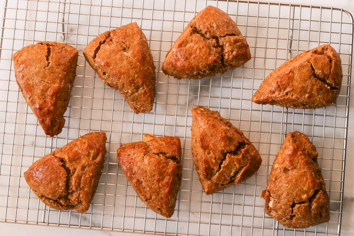 Gingerbread scones cooling on a wire rack.