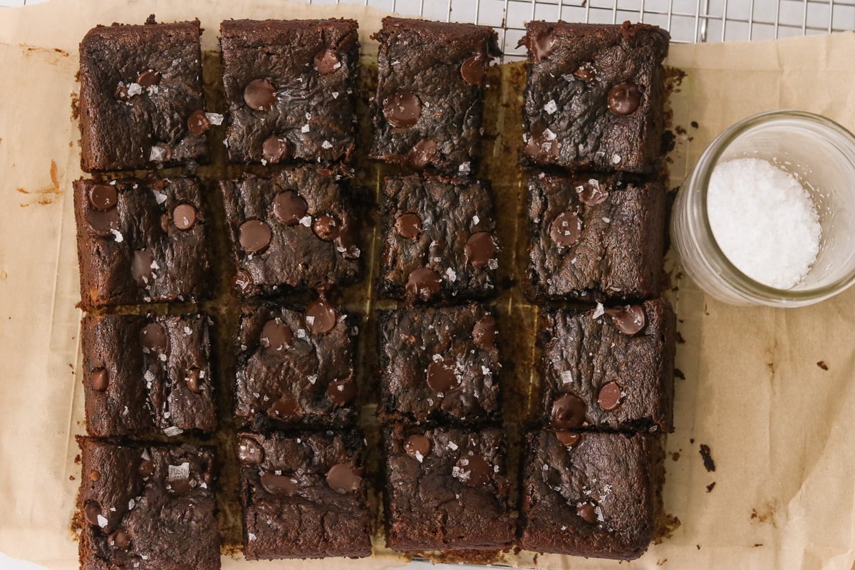 Sweet potato brownies sliced on brown parchment paper.