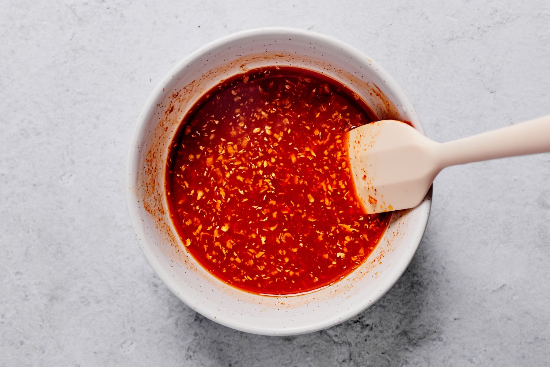 Gochujang sauce ingredients mixed together in a small bowl.