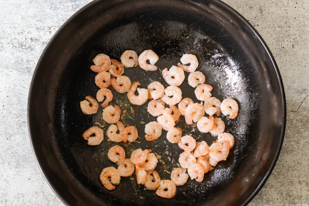 shrimp frying in a wok