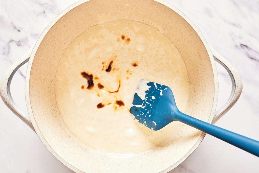 Smooth, glossy melted mini marshmallows and butter in a saucepan